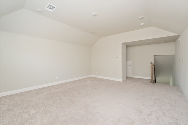 2614 Dakota Cir, Corinth, TX 76210 - bonus room featuring vaulted ceiling, light carpet, and baseboards
