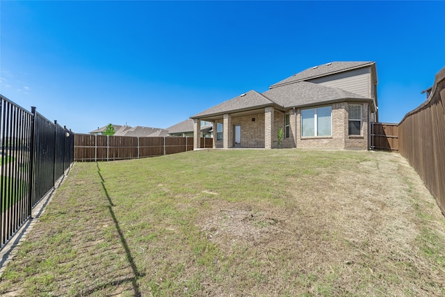 2614 Dakota Cir, Corinth, TX 76210 - back of property with brick siding and roof with shingles