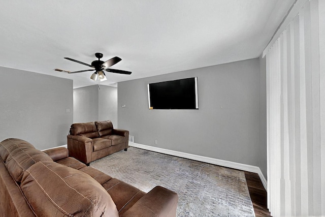 6912 Griggs St, Forest Hill, TX 76140 - living room featuring baseboards, wood finished floors, and a ceiling fan