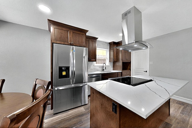 6912 Griggs St, Forest Hill, TX 76140 - kitchen with appliances with stainless steel finishes, island range hood, dark wood-type flooring, a kitchen island, and dark brown cabinetry