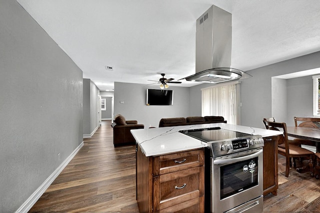 6912 Griggs St, Forest Hill, TX 76140 - kitchen featuring stainless steel range with electric cooktop, island range hood, dark wood-type flooring, baseboards, and open floor plan