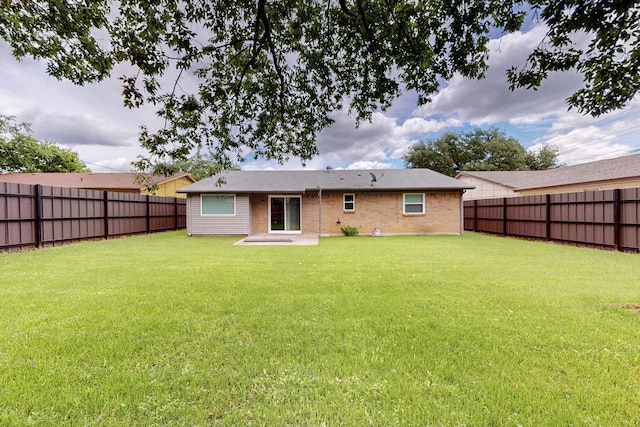6912 Griggs St, Forest Hill, TX 76140 - rear view of house featuring brick siding