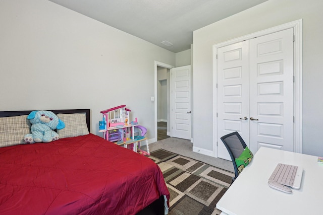 13736 Kevin Dr, Frisco, TX 75035 - bedroom with carpet flooring, baseboards, and a closet