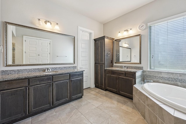 13736 Kevin Dr, Frisco, TX 75035 - full bath featuring a garden tub and two vanities