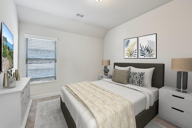 13736 Kevin Dr, Frisco, TX 75035 - bedroom featuring light carpet, baseboards, and vaulted ceiling