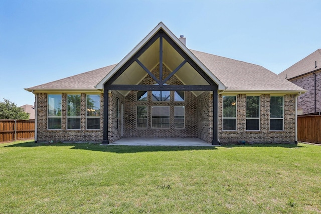 13736 Kevin Dr, Frisco, TX 75035 - back of property featuring brick siding, a patio area, a chimney, and a shingled roof