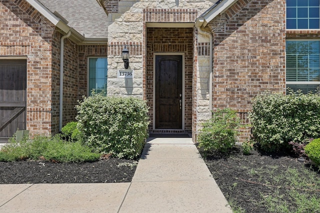 13736 Kevin Dr, Frisco, TX 75035 - entrance to property with brick siding and roof with shingles