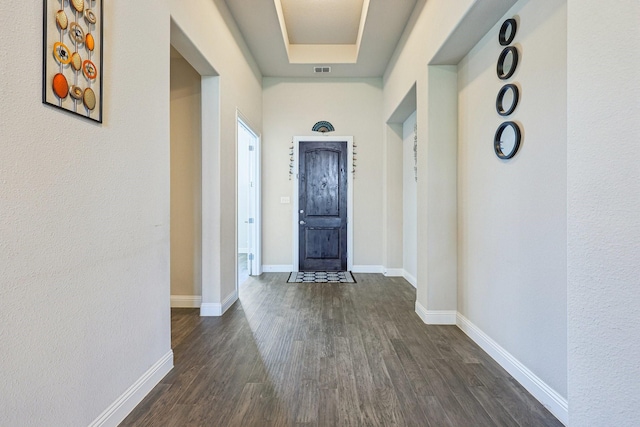 13736 Kevin Dr, Frisco, TX 75035 - entryway featuring dark wood-type flooring and baseboards