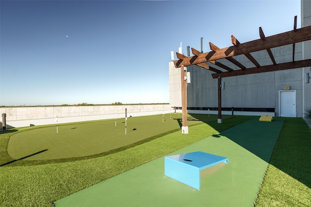 5909 Luther Ln Unit 2200, Dallas, TX 75225 - surrounding community featuring an area to practice putting and a pergola