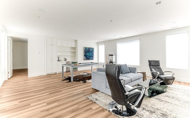 8404 Swananoah Rd, Dallas, TX 75209 - living room featuring light wood-style floors and baseboards