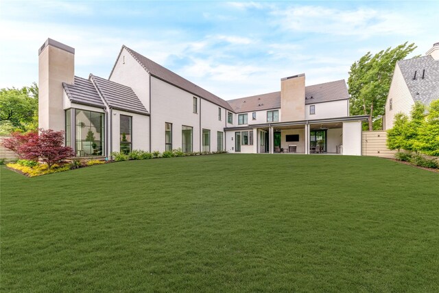 8404 Swananoah Rd, Dallas, TX 75209 - rear view of house featuring a chimney, stucco siding, and a patio