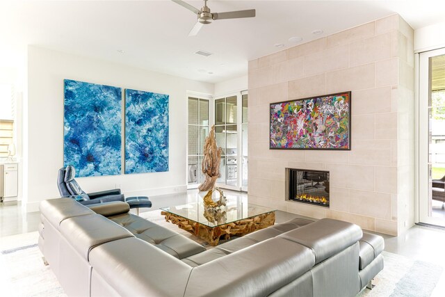 8404 Swananoah Rd, Dallas, TX 75209 - living room featuring ceiling fan and a tile fireplace