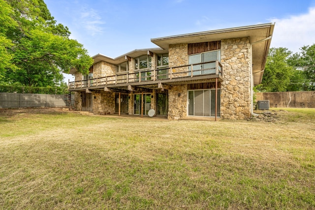 4208 Shore Front Dr, Fort Worth, TX 76135 - rear view of house featuring stone siding, a wooden deck, and cooling unit