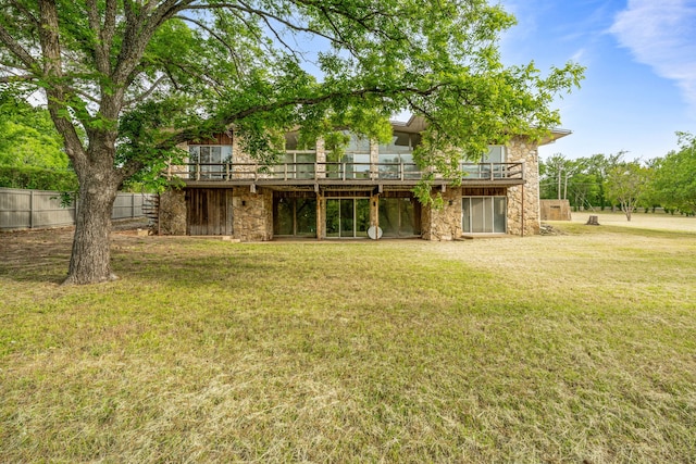 4208 Shore Front Dr, Fort Worth, TX 76135 - rear view of house featuring stone siding and a wooden deck
