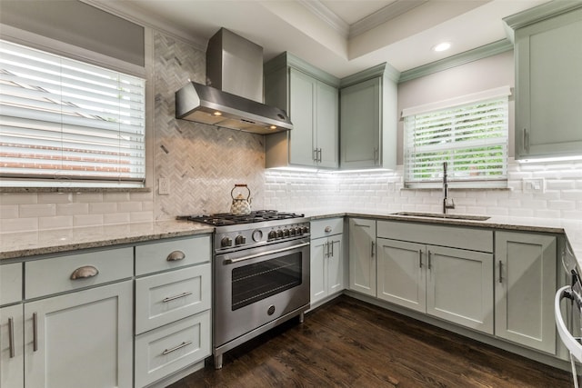 7514 Caillet St, Dallas, TX 75209 - kitchen with a sink, stainless steel stove, wall chimney exhaust hood, ornamental molding, and tasteful backsplash
