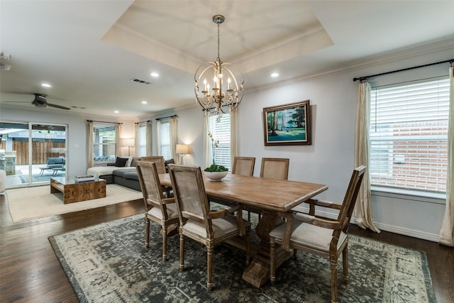 7514 Caillet St, Dallas, TX 75209 - dining space featuring crown molding, a chandelier, dark wood finished floors, a tray ceiling, and recessed lighting