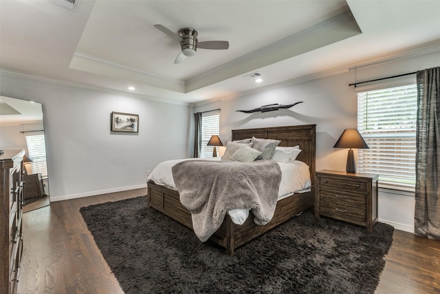 7514 Caillet St, Dallas, TX 75209 - bedroom featuring a raised ceiling, multiple windows, crown molding, dark wood-style floors, and recessed lighting
