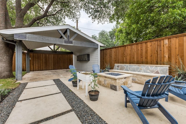 7514 Caillet St, Dallas, TX 75209 - view of patio with an outdoor fire pit, fence, and a gazebo