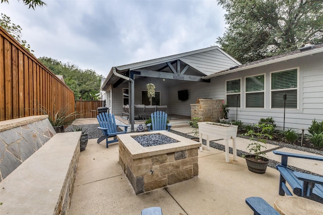 7514 Caillet St, Dallas, TX 75209 - view of patio with an outdoor living space with a fire pit and a fenced backyard