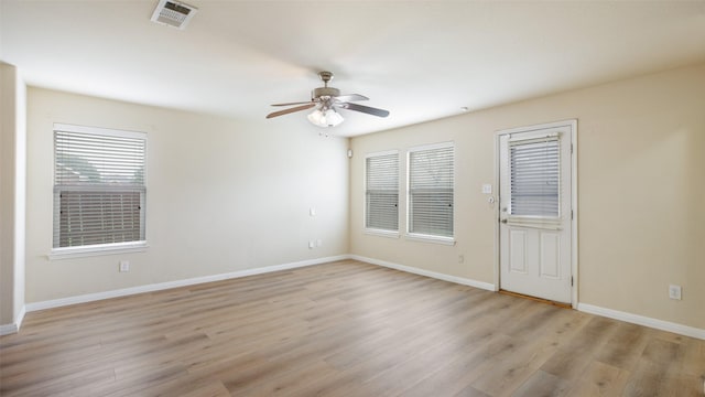 1508 Mockingbird Dr, Aubrey, TX 76227 - unfurnished room featuring light wood-style flooring, ceiling fan, and baseboards