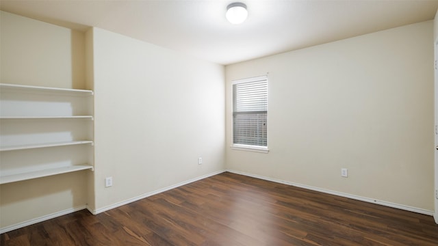 1508 Mockingbird Dr, Aubrey, TX 76227 - unfurnished room featuring dark wood-type flooring and baseboards