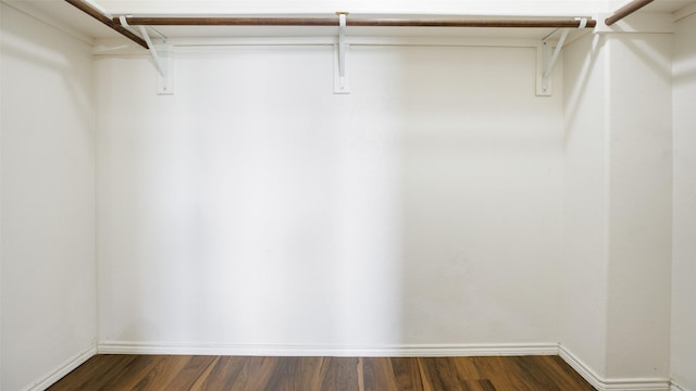 1508 Mockingbird Dr, Aubrey, TX 76227 - spacious closet with dark wood-type flooring