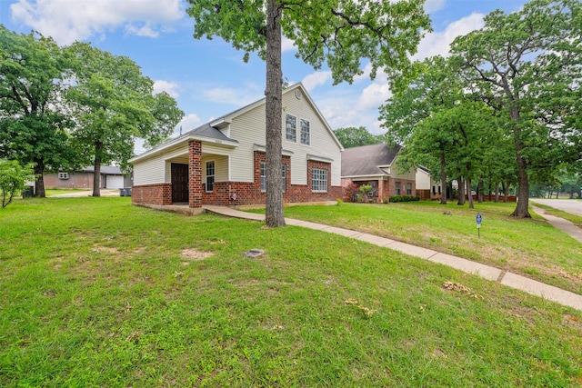 10315 Budtime Ln, Dallas, TX 75217 - view of front facade featuring brick siding and a front yard