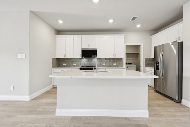 510 Willet Dr, Mckinney, TX 75069 - kitchen with stainless steel refrigerator with ice dispenser, a sink, light countertops, tasteful backsplash, and recessed lighting