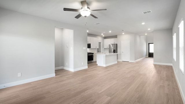 516 Willet Dr, Mckinney, TX 75069 - unfurnished living room featuring ceiling fan, light wood-style flooring, and recessed lighting