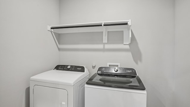 516 Willet Dr, Mckinney, TX 75069 - laundry room featuring separate washer and dryer
