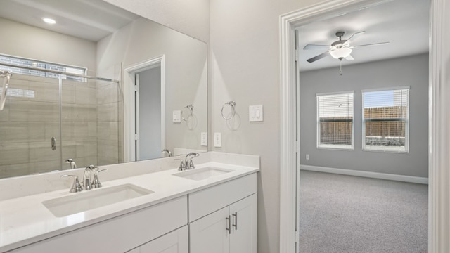 516 Willet Dr, Mckinney, TX 75069 - bathroom featuring double vanity, a shower stall, and ceiling fan