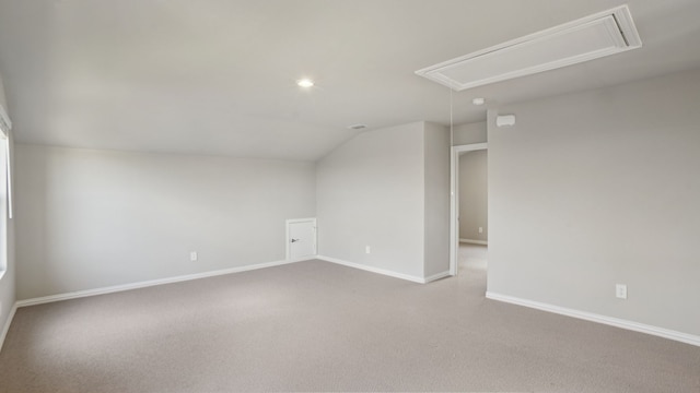 516 Willet Dr, Mckinney, TX 75069 - bonus room featuring attic access, lofted ceiling, carpet, and recessed lighting