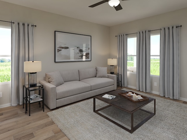 516 Willet Dr, Mckinney, TX 75069 - living room featuring a ceiling fan, light wood-style floors, and baseboards