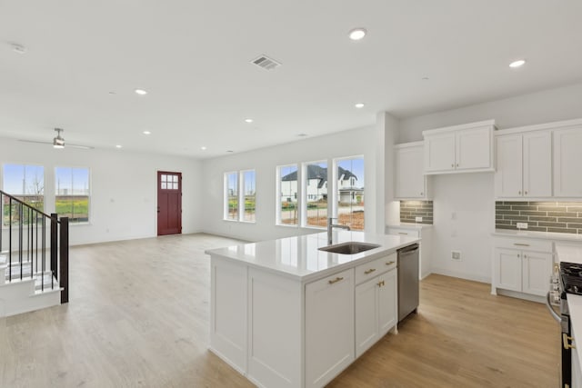 15792 Millwood Trl, Frisco, TX 75033 - kitchen featuring a sink, stainless steel appliances, healthy amount of natural light, tasteful backsplash, and recessed lighting