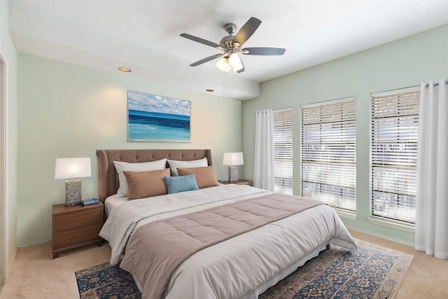 3101 Townbluff Dr Unit 1013, Plano, TX 75075 - bedroom featuring light colored carpet, a ceiling fan, and baseboards