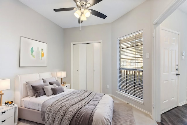 3101 Townbluff Dr Unit 1013, Plano, TX 75075 - bedroom featuring a closet, a ceiling fan, and baseboards