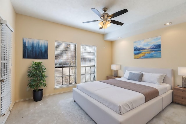 3101 Townbluff Dr Unit 1013, Plano, TX 75075 - carpeted bedroom with baseboards, a ceiling fan, and recessed lighting