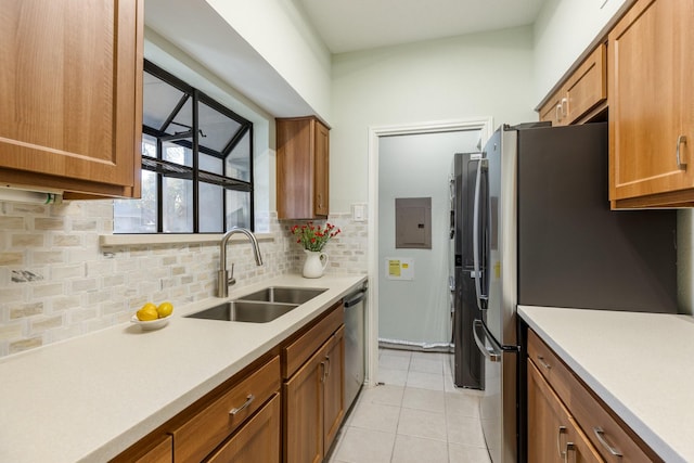 3101 Townbluff Dr Unit 1013, Plano, TX 75075 - kitchen featuring a sink, electric panel, stainless steel appliances, light countertops, and decorative backsplash