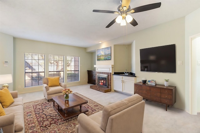 3101 Townbluff Dr Unit 1013, Plano, TX 75075 - living room featuring light carpet, a brick fireplace, and ceiling fan