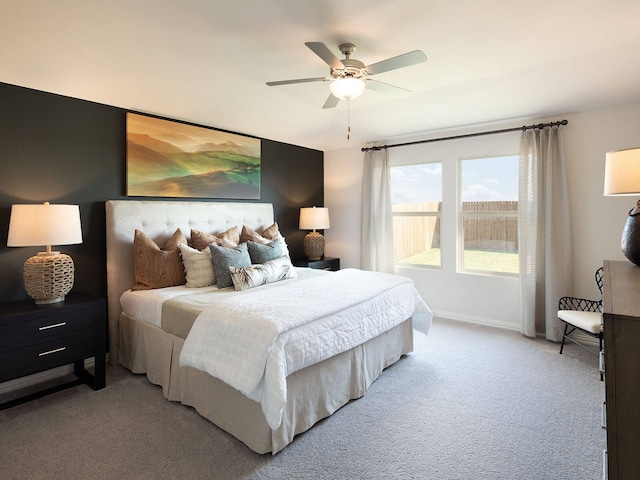 502 Stagg St, Mckinney, TX 75069 - bedroom with light colored carpet, baseboards, and ceiling fan