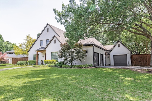 3970 Cobblestone Cir, Dallas, TX 75229 - view of front of home with a garage, a standing seam roof, and brick siding