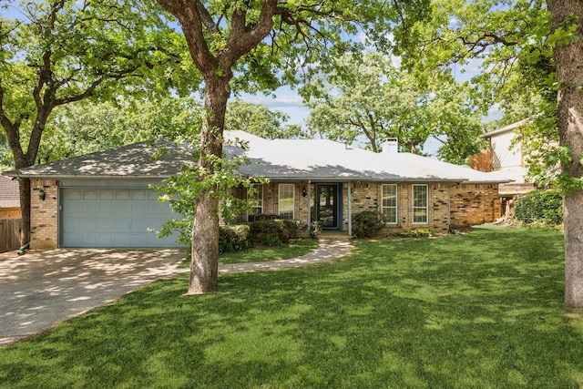 2207 Oakwood Ln, Arlington, TX 76012 - ranch-style home featuring brick siding, a garage, concrete driveway, a chimney, and a front lawn
