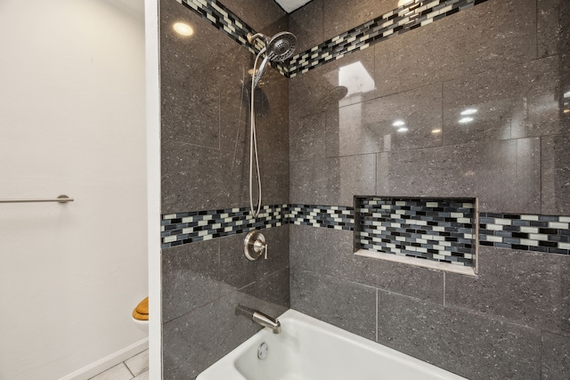 2207 Oakwood Ln, Arlington, TX 76012 - bathroom with bathtub / shower combination, baseboards, and tile patterned flooring