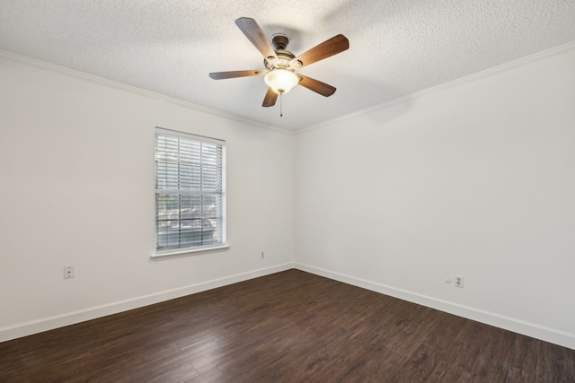 2207 Oakwood Ln, Arlington, TX 76012 - spare room featuring dark wood-style floors, a ceiling fan, crown molding, a textured ceiling, and baseboards