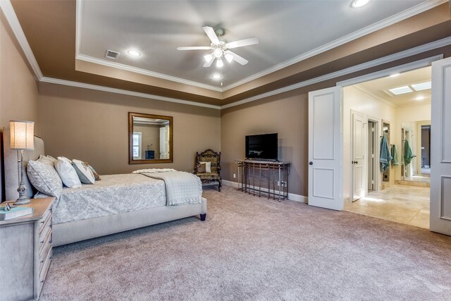 6521 Del Norte Ln, Dallas, TX 75225 - bedroom featuring light carpet, ornamental molding, a tray ceiling, baseboards, and a ceiling fan