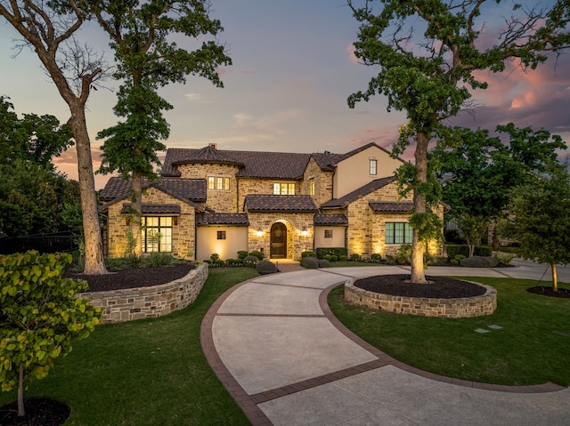 2210 Barcelona Ct, Westlake, TX 76262 - view of front of house featuring curved driveway, stone siding, and stucco siding