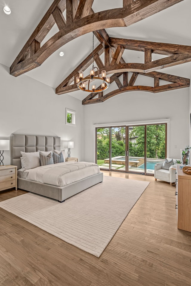 2210 Barcelona Ct, Westlake, TX 76262 - bedroom with access to exterior, a chandelier, beamed ceiling, recessed lighting, and wood finished floors