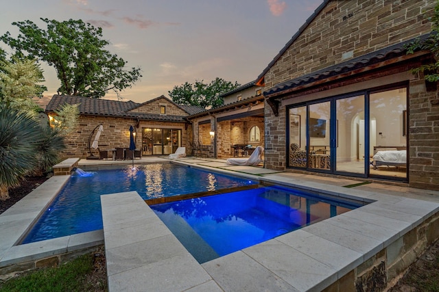 2210 Barcelona Ct, Westlake, TX 76262 - view of swimming pool featuring a patio and a pool with connected hot tub