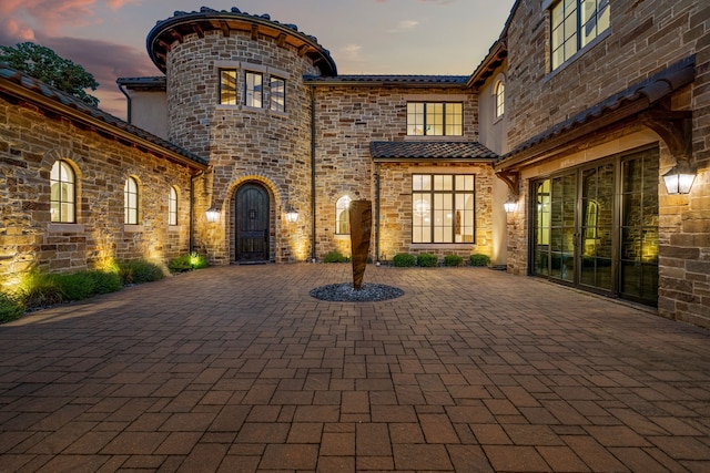 2210 Barcelona Ct, Westlake, TX 76262 - patio terrace at dusk with a patio area