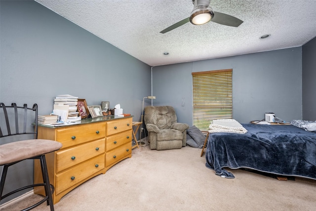 425 Headlee St, Denton, TX 76201 - bedroom featuring light colored carpet, a textured ceiling, and a ceiling fan